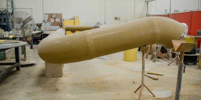 Más Allá del Metal: La Resistencia Inquebrantable de la Fibra de Vidrio (FRP) en Entornos Industriales Corrosivos por HCN Ingeniería Metálica SAC